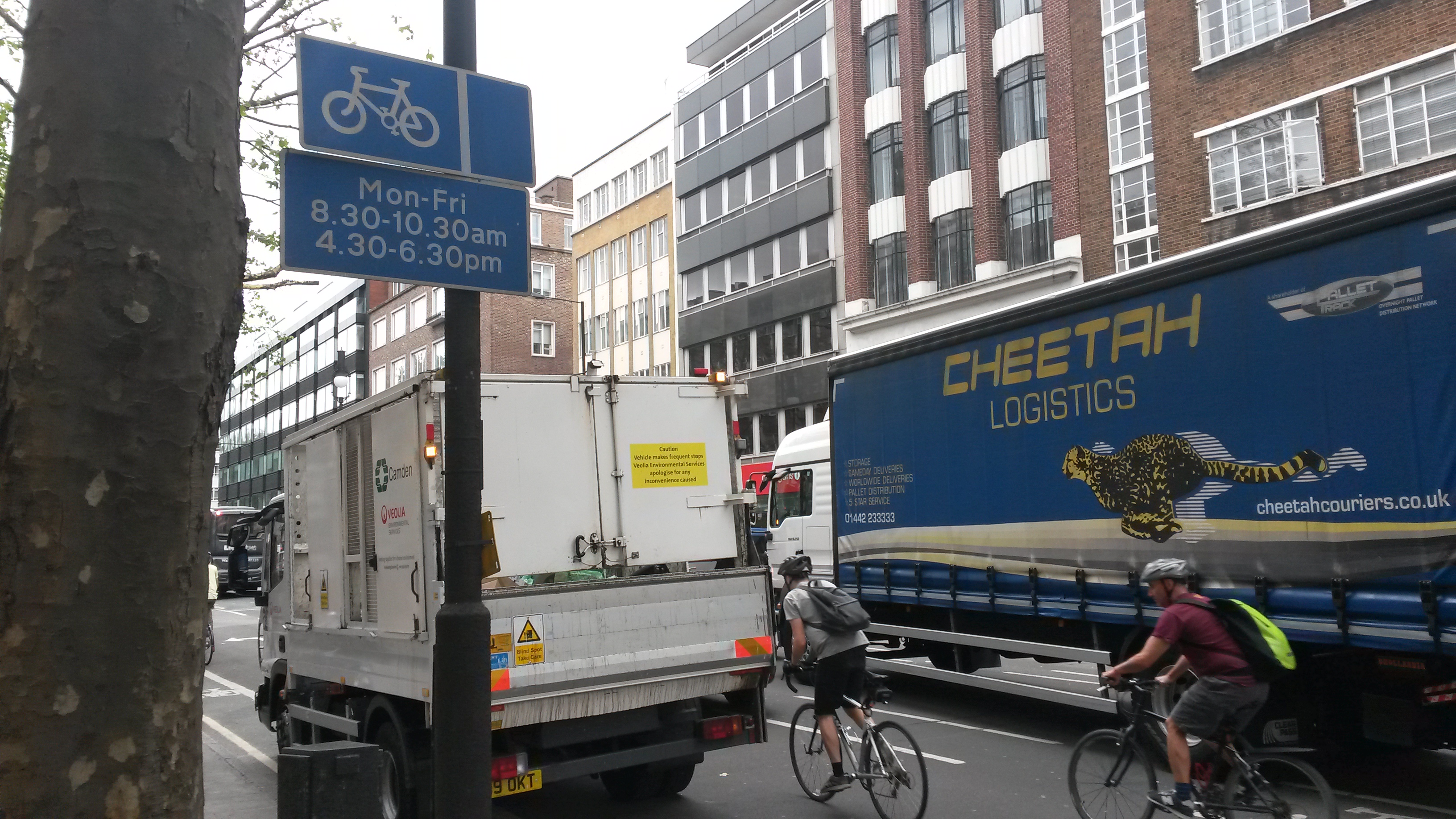 Truck parked in cycle lane on Tottenham Court Road.