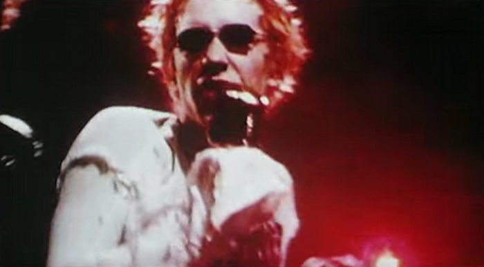 Johnny Rotten aka John Lydon, singing.