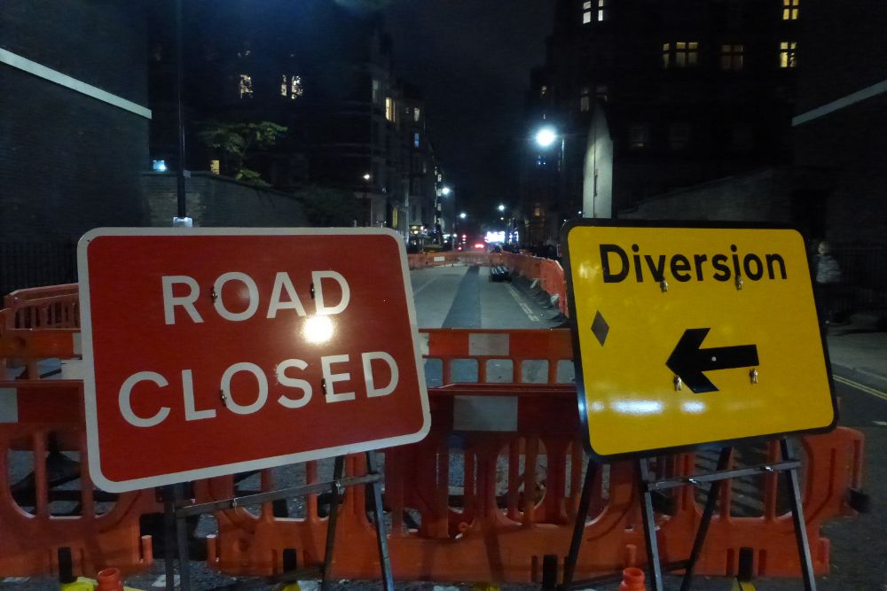 Road closed and diversion signs.