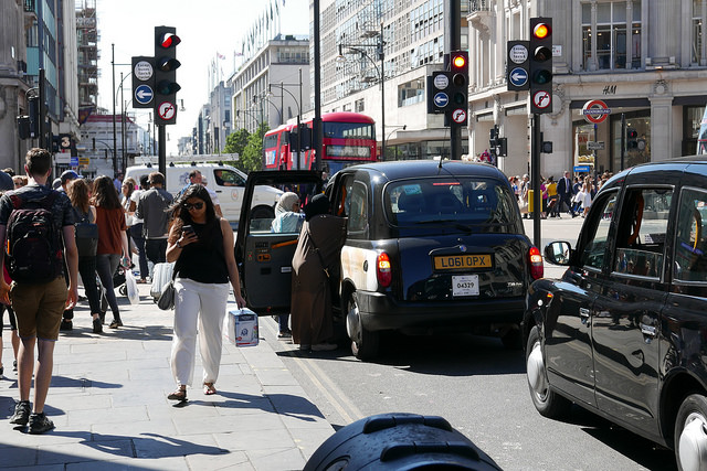 Buses and taxis on Oxford Street.