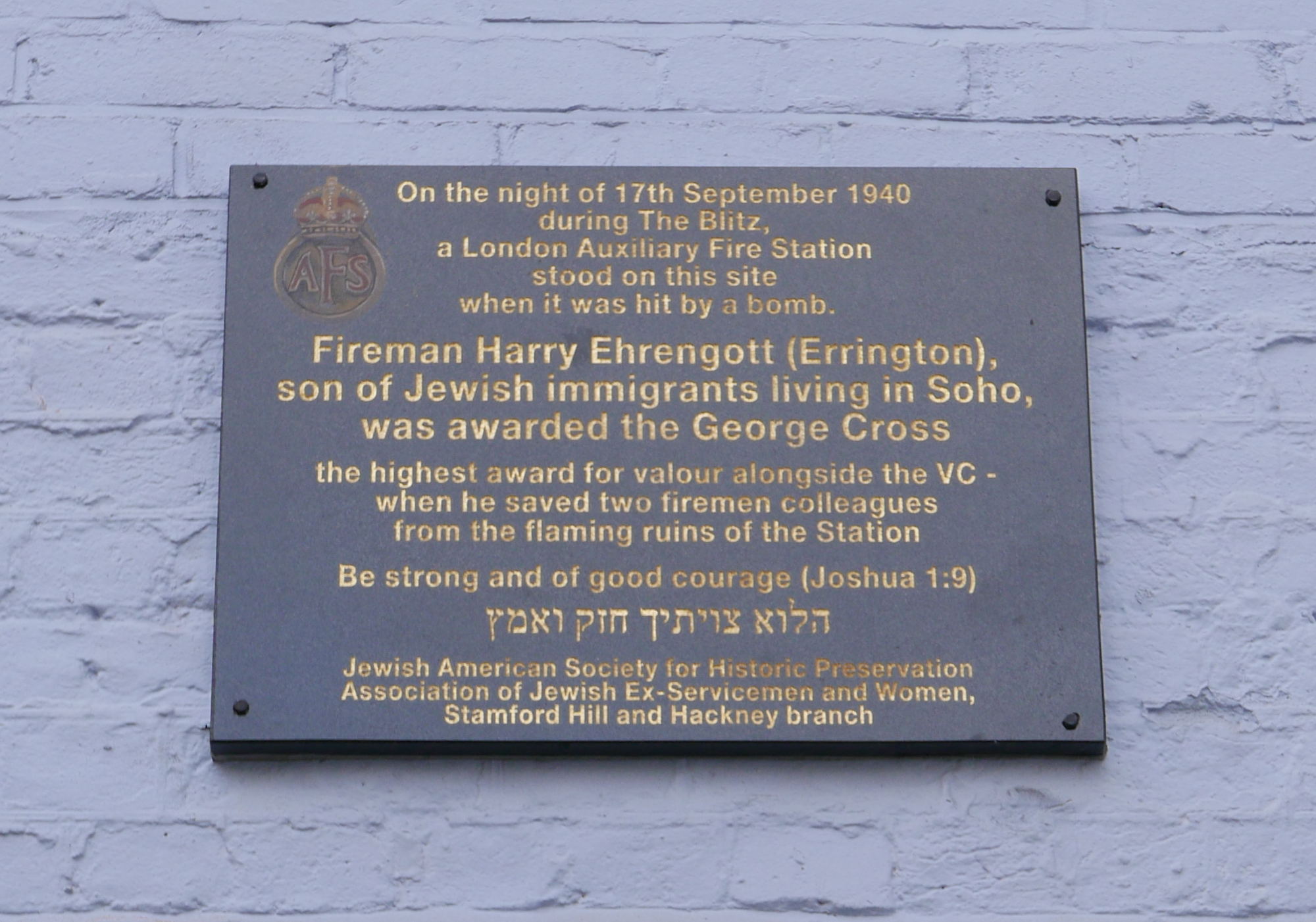 Plaque on wall.