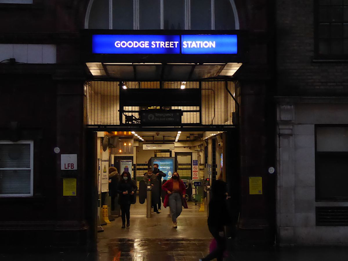 Passengers wearing face coverings leave Goodge Street Station in Fitzrovia in Central London.